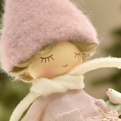 Figurine de Noël Fillette à bonnet rose sur Flocon LED