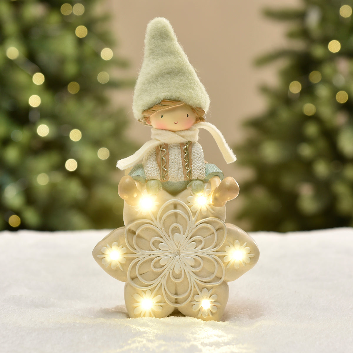 Figurina di Noël Garçon à bonnet vert sur Flocon LED