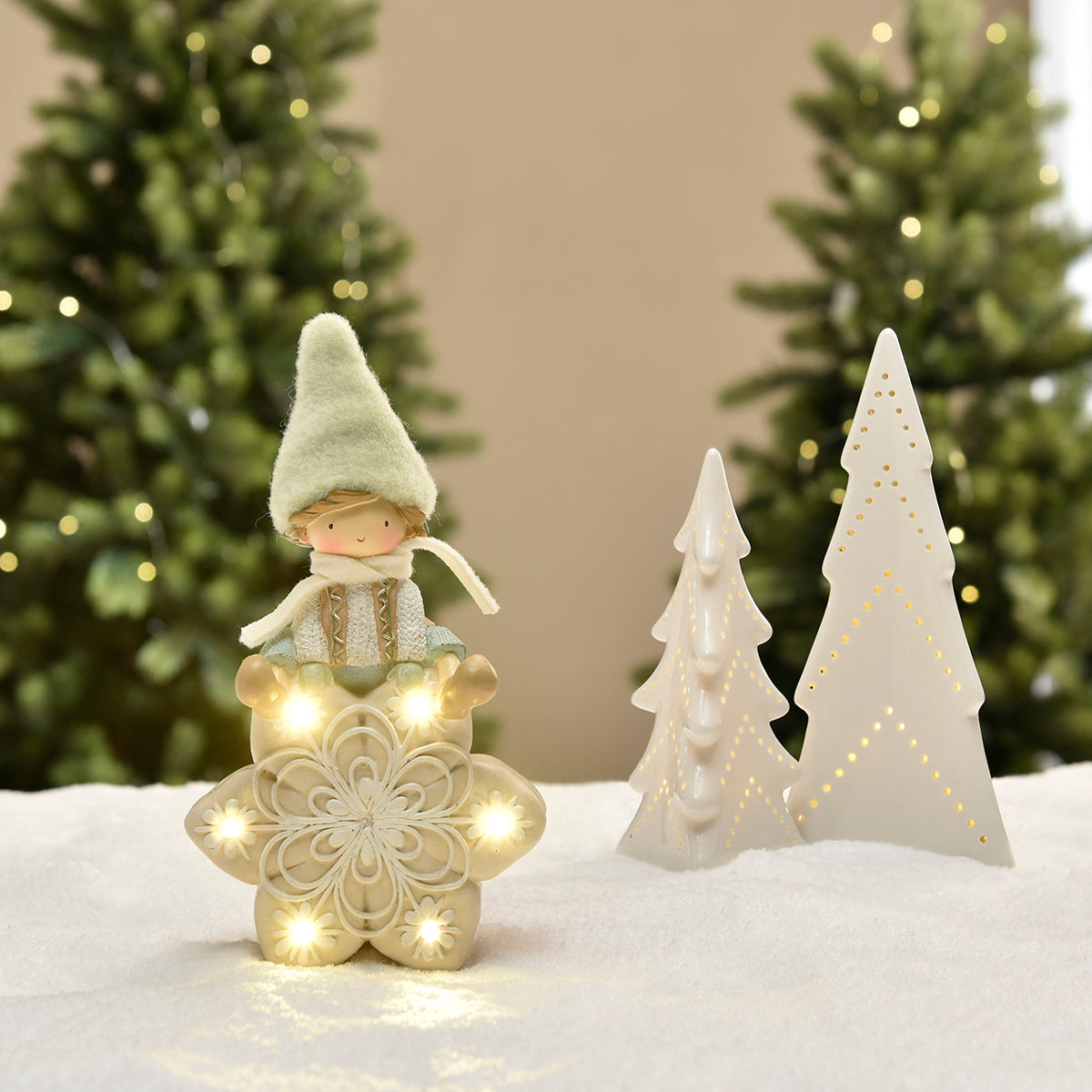 Figurina di Noël Garçon à bonnet vert sur Flocon LED