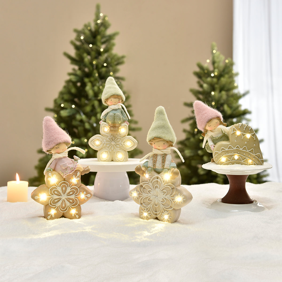 Figurina di Noël Garçon à bonnet vert sur Flocon LED