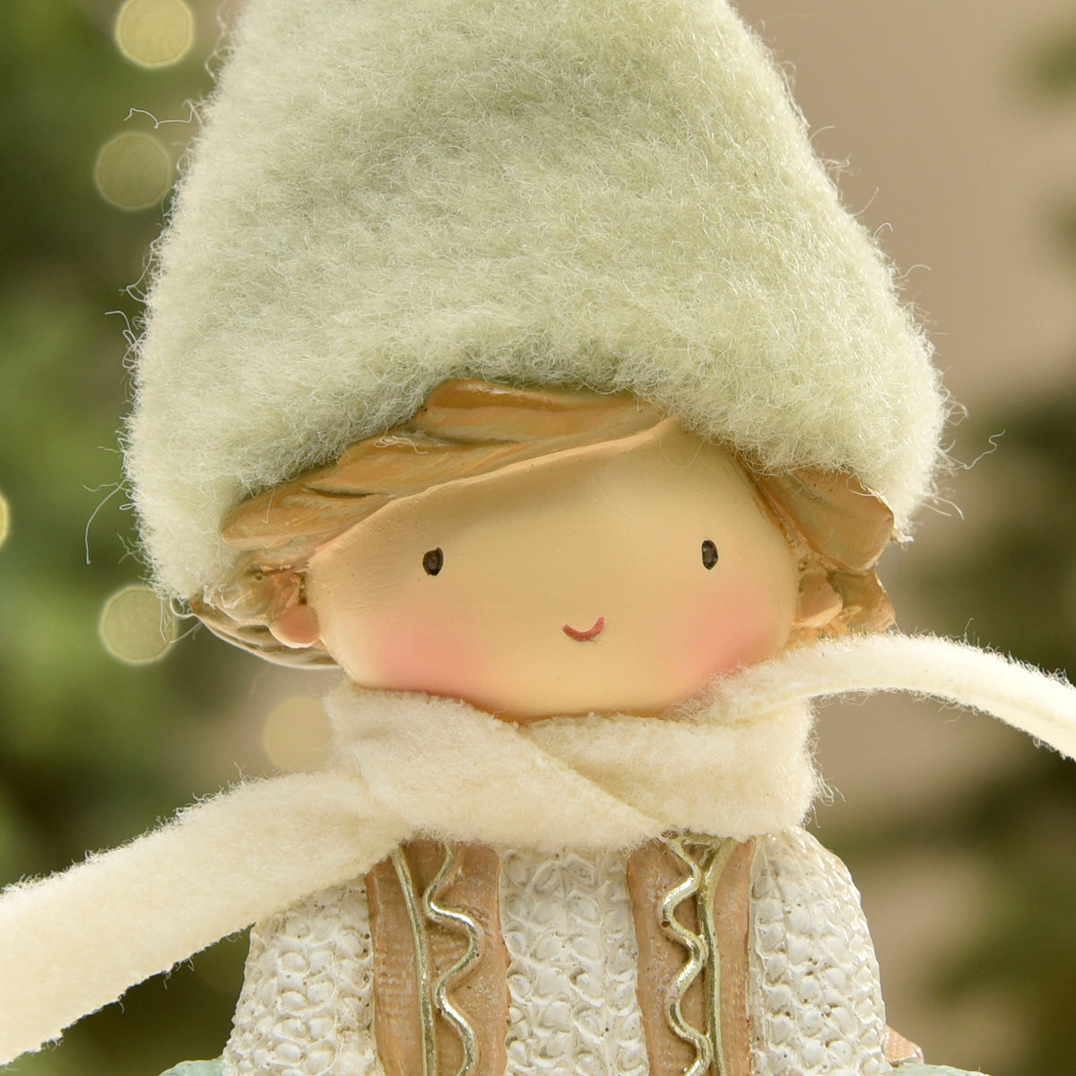 Figurina di Noël Garçon à bonnet vert sur Flocon LED