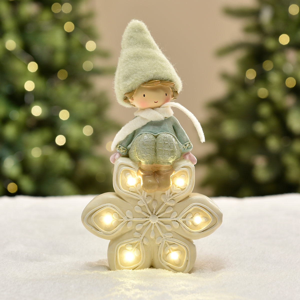 Figurina di Noël Garçon à bonnet vert sur Flocon LED