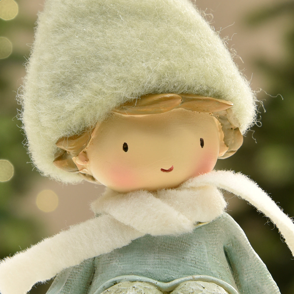 Figurina di Noël Garçon à bonnet vert sur Flocon LED