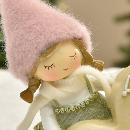 Figurine de Noël Fillette à bonnet rose sur Coeur LED